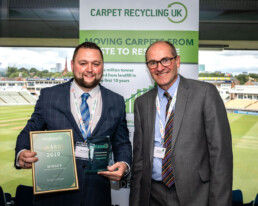 Take Back Partner Winner Glenn Mitchell of Designer Contracts with Robert Barker of Carpet Recycling UK